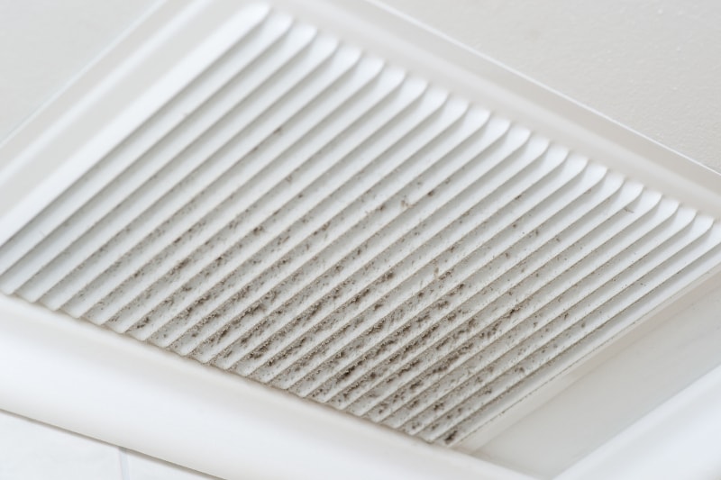 What are the common causes of poor airflow from my AC vents in San Marcos, TX